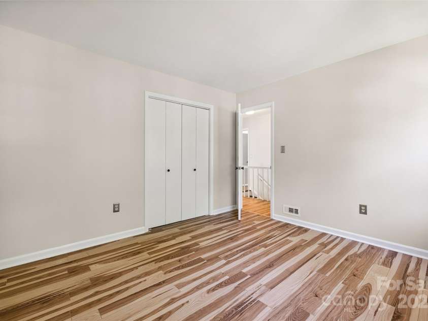 4911 Rivergreen Lane, Charlotte, NC 28227.  MLS# CAR4272250, YatesRealty ID 23250. Bedroom #2 upstairs