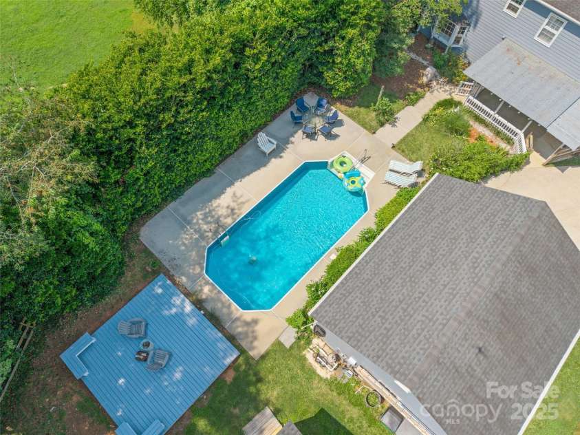 4911 Rivergreen Lane, Charlotte, NC 28227.  MLS# CAR4272250, YatesRealty ID 23250. In-ground pool with tons of privacy!