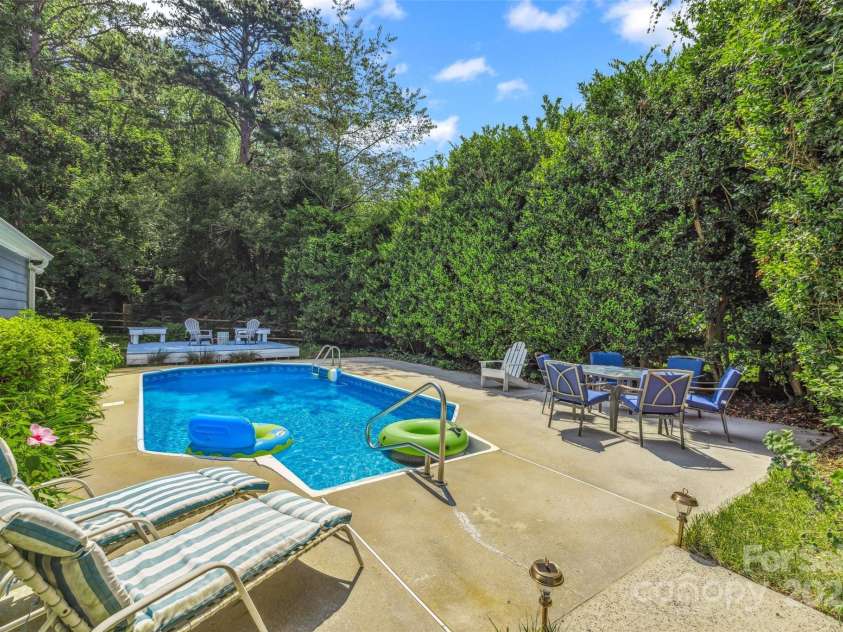 4911 Rivergreen Lane, Charlotte, NC 28227.  MLS# CAR4272250, YatesRealty ID 23250. In-ground salt water pool with liner from 2022