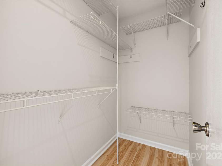 4911 Rivergreen Lane, Charlotte, NC 28227.  MLS# CAR4272250, YatesRealty ID 23250. Second walk-in closet in primary bedroom