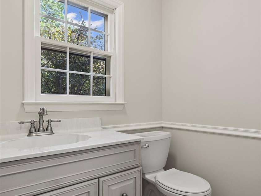 4911 Rivergreen Lane, Charlotte, NC 28227.  MLS# CAR4272250, YatesRealty ID 23250. Updated half bath on the main level