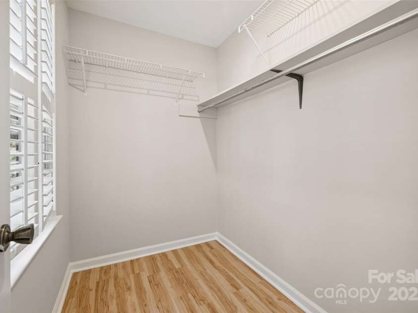 4911 Rivergreen Lane, Charlotte, NC 28227.  MLS# CAR4272250, YatesRealty ID 23250. Walk-in closet off primary bedroom