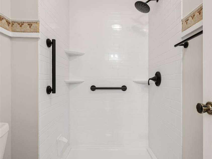 4911 Rivergreen Lane, Charlotte, NC 28227.  MLS# CAR4272250, YatesRealty ID 23250. Walk-in shower in primary bathroom