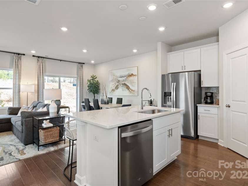 5054 Kellaher Place, Charlotte, NC 28216.  MLS# CAR4215713, YatesRealty ID 23255. Photo is not of the actual home but is an inspirational photo of builder’s model home and may depict options, furnishings, and/or decorator features that are not included.