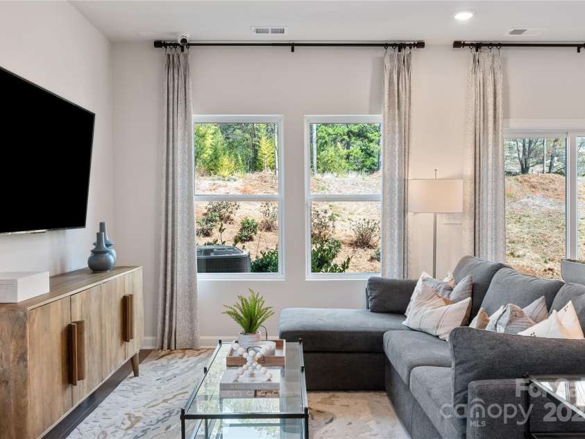 5054 Kellaher Place, Charlotte, NC 28216.  MLS# CAR4215713, YatesRealty ID 23255. Photo is not of the actual home but is an inspirational photo of builder’s model home and may depict options, furnishings, and/or decorator features that are not included.