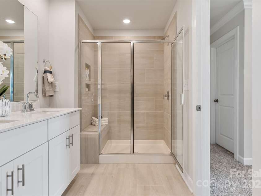 5054 Kellaher Place, Charlotte, NC 28216.  MLS# CAR4215713, YatesRealty ID 23255. Photo is not of the actual home but is an inspirational photo of builder’s model home and may depict options, furnishings, and/or decorator features that are not included.