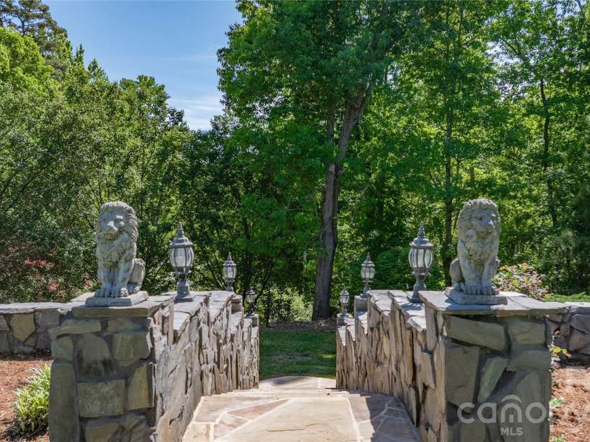 7362 Volunteer Rescue Road, Denton, NC 27239.  MLS# CAR4370916, YatesRealty ID 23257. Rock steps down the front yard