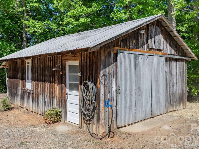 7362 Volunteer Rescue Road, Denton, NC 27239.  MLS# CAR4370916, YatesRealty ID 23257. Workshop with cement floor and power