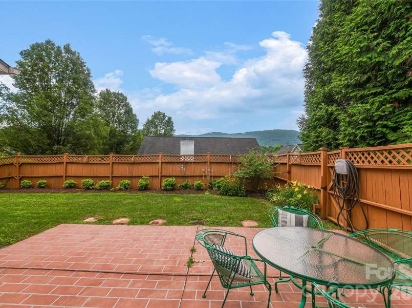 7 Morning Mist Road, Fletcher, NC 28732.  MLS# CAR4368070, YatesRealty ID 23258. Back Patio 