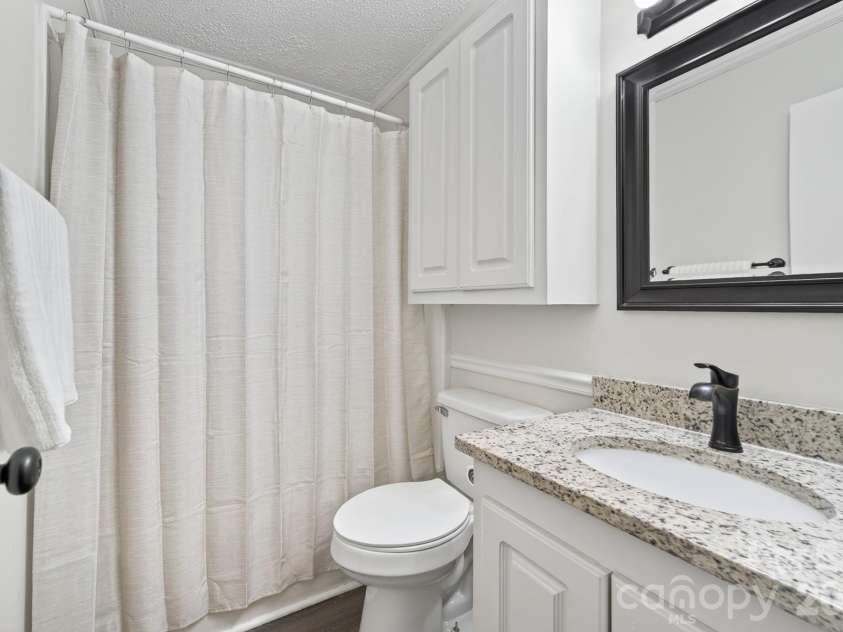 204 Harrelson Road, Cherryville, NC 28021.  MLS# CAR4373774, YatesRealty ID 23260. Hall Bathroom