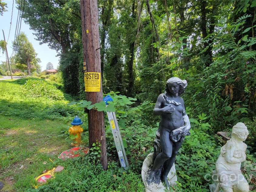 160 Cleveland Road, Tryon, NC 28782.  MLS# CAR4274322, YatesRealty ID 23261. Left lot