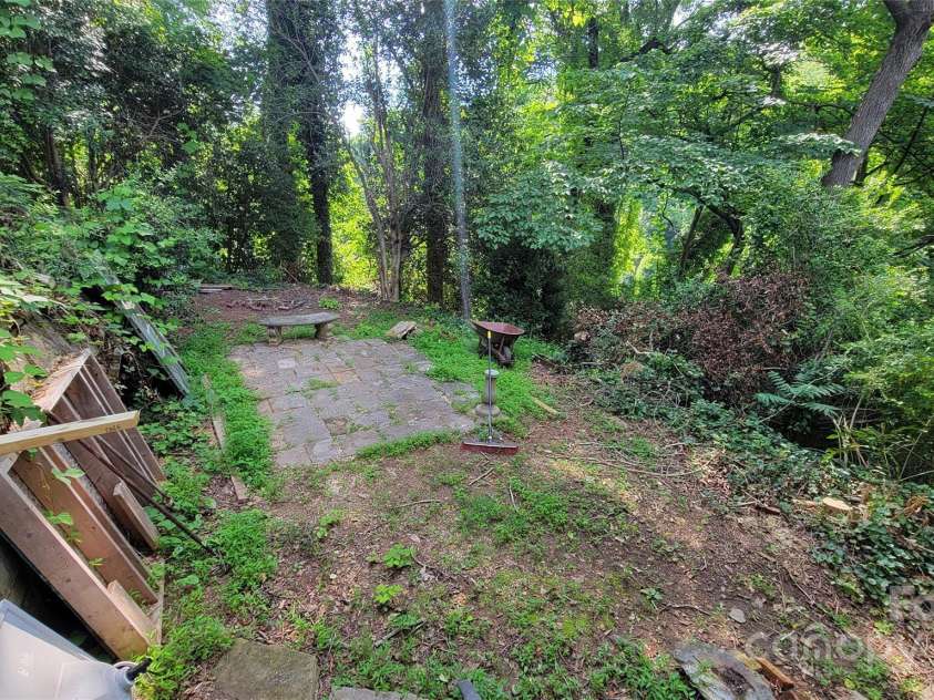 160 Cleveland Road, Tryon, NC 28782.  MLS# CAR4274322, YatesRealty ID 23261. Outdoor space to left of basement