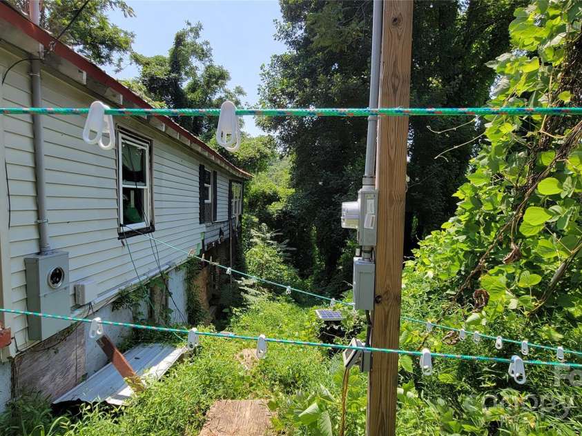 160 Cleveland Road, Tryon, NC 28782.  MLS# CAR4274322, YatesRealty ID 23261. Right of structure