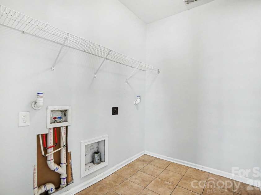 3208 Bur Oak Drive, Gastonia, NC 28056.  MLS# CAR4380752, YatesRealty ID 23261. Laundry Room
