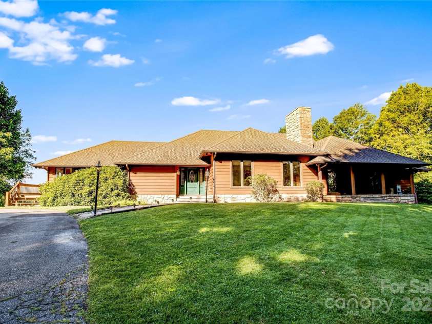 1087 Brigadoon Drive, Clyde, NC 28721.  MLS# CAR4276623, YatesRealty ID 23272. 1087 Brigadoon- Island in the sky