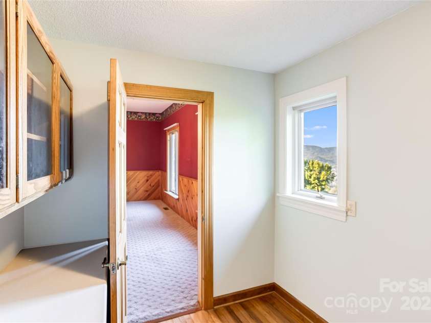 1087 Brigadoon Drive, Clyde, NC 28721.  MLS# CAR4276623, YatesRealty ID 23272. Butler's pantry