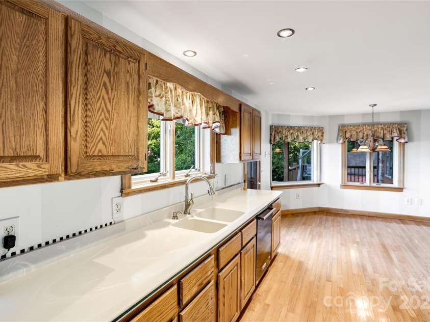 1087 Brigadoon Drive, Clyde, NC 28721.  MLS# CAR4276623, YatesRealty ID 23272. Spacious kitchen