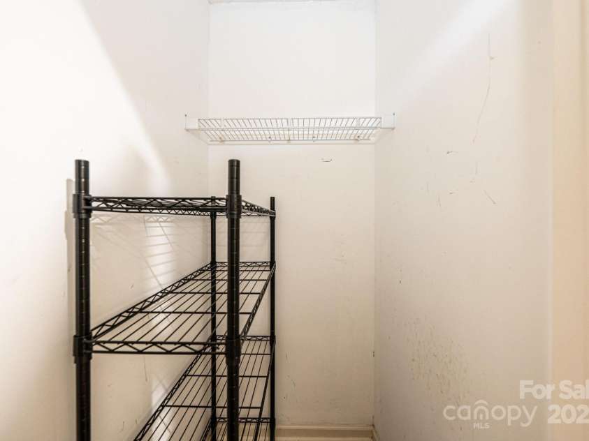 709 21st Avenue, Hickory, NC 28601.  MLS# CAR4276876, YatesRealty ID 23275. Storage closet in main level hallway