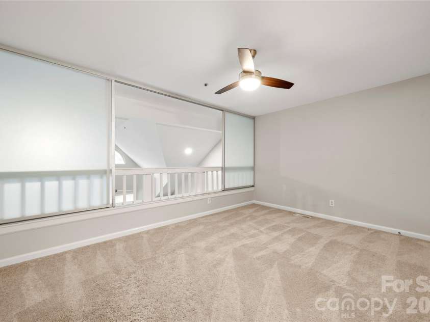509 Graham Street, Charlotte, NC 28202.  MLS# CAR4333600, YatesRealty ID 2328. Upper level bedroom