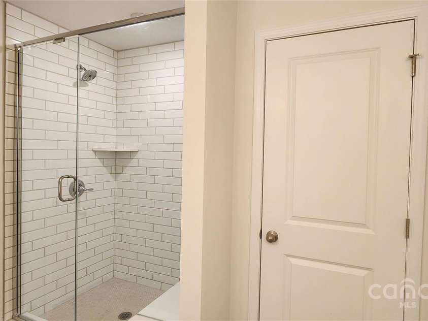 738 Sirius Lane, York, SC 29745.  MLS# CAR4324398, YatesRealty ID 2328. Primary shower with seat and tile to ceiling