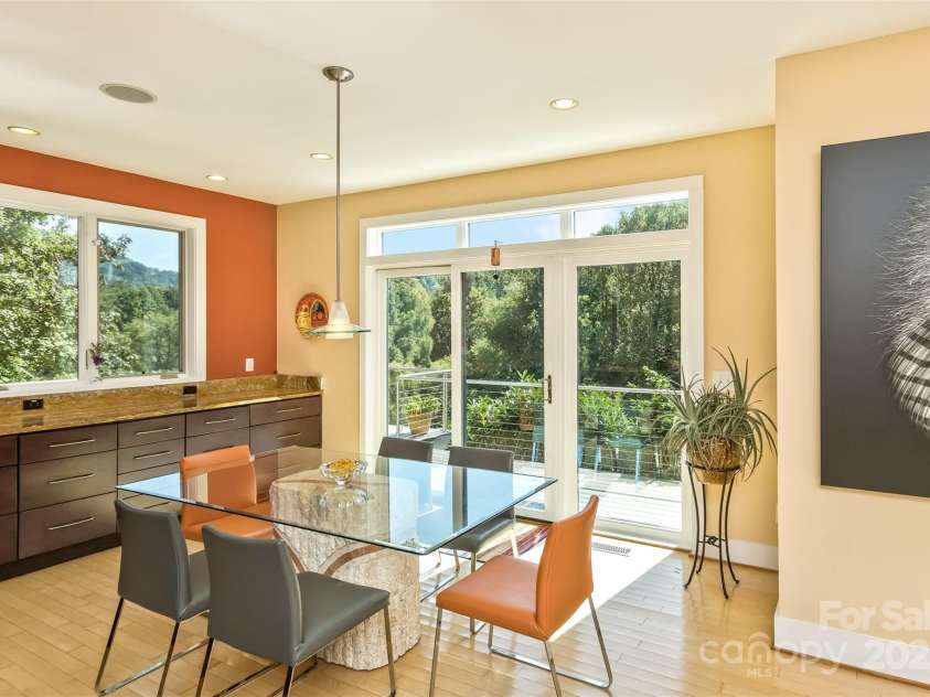 404 Amanda Drive, Mars Hill, NC 28754.  MLS# CAR4232022, YatesRealty ID 2330. Dining area leads out to the deck