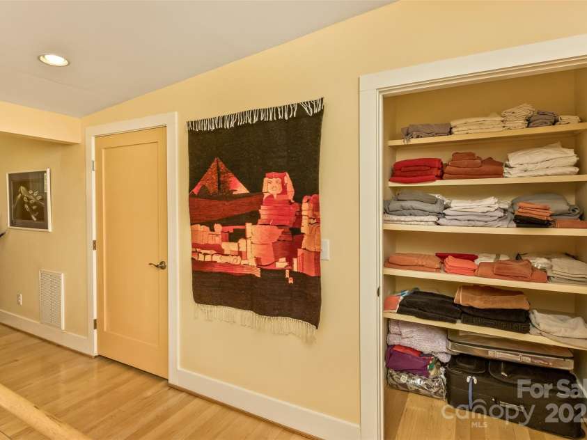 404 Amanda Drive, Mars Hill, NC 28754.  MLS# CAR4232022, YatesRealty ID 2330. Upstairs linen closet off the bedrooms