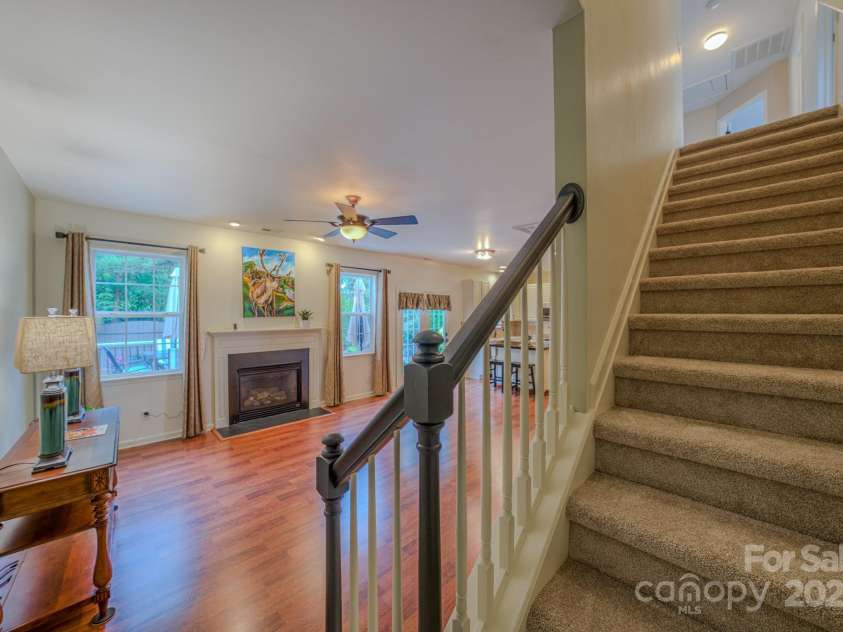 36 Stone River Drive, Asheville, NC 28804.  MLS# CAR4268666, YatesRealty ID 23301. Brand new carpet leading upstairs from the living room.