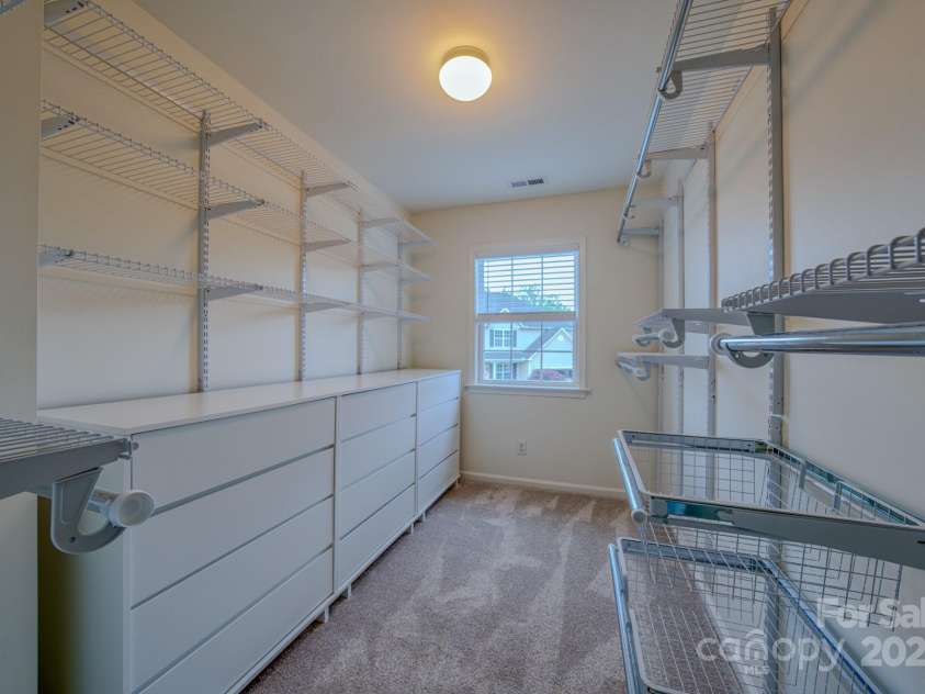 36 Stone River Drive, Asheville, NC 28804.  MLS# CAR4268666, YatesRealty ID 23301. Large walk in closet.