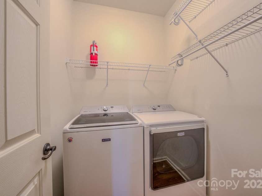 36 Stone River Drive, Asheville, NC 28804.  MLS# CAR4268666, YatesRealty ID 23301. Laundry room is located on main floor near the kitchen.