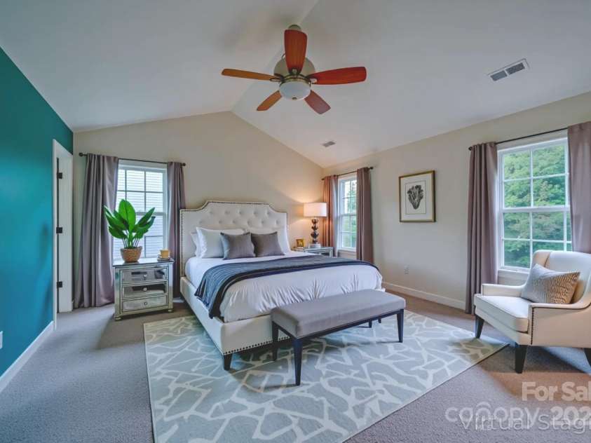 36 Stone River Drive, Asheville, NC 28804.  MLS# CAR4268666, YatesRealty ID 23301. Virtually staged primary bedroom suite.