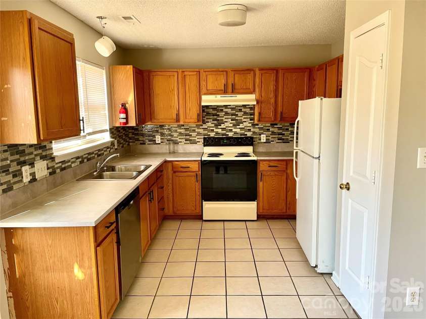 12151 Brownestone View Drive, Charlotte, NC 28269.  MLS# CAR4336952, YatesRealty ID 2331. 