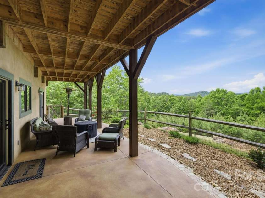 39 Lakeside Path, Nebo, NC 28761.  MLS# CAR4381532, YatesRealty ID 23320. Backyard Patio