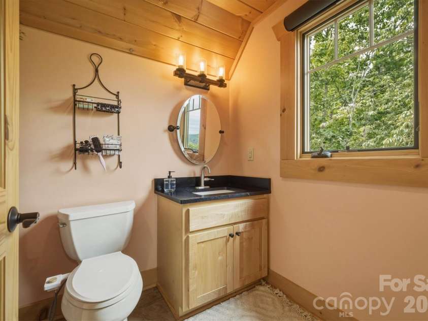 39 Lakeside Path, Nebo, NC 28761.  MLS# CAR4381532, YatesRealty ID 23320. Loft Bathroom