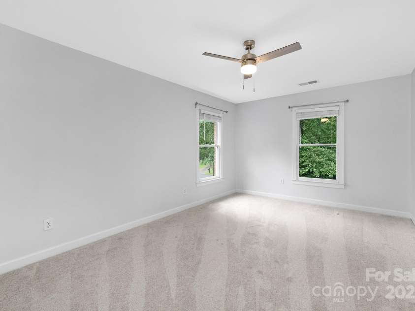 8217 Lansford Road, Charlotte, NC 28277.  MLS# CAR4294390, YatesRealty ID 23321. Bedroom 2 w/new fan