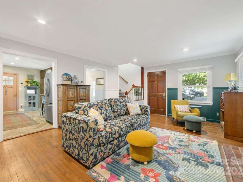 2034 Lanier Avenue, Charlotte, NC 28205.  MLS# CAR4270722, YatesRealty ID 23326. Open living room