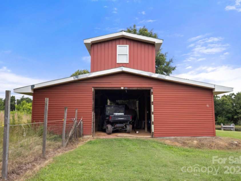 3451 Greene Road, Monroe, NC 28110.  MLS# CAR4271557, YatesRealty ID 23327. 1300 sq ft Barn with no maintenance Vinyl siding