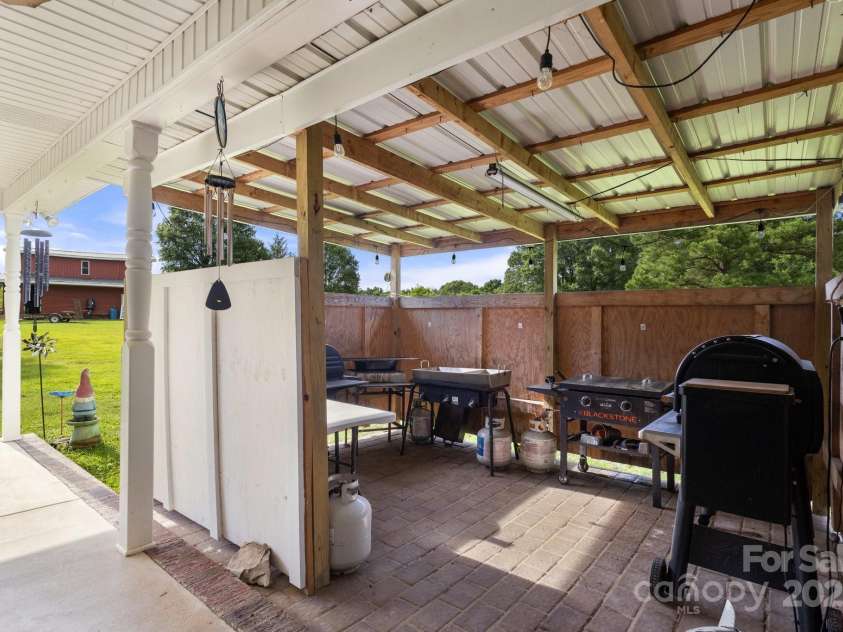 3451 Greene Road, Monroe, NC 28110.  MLS# CAR4271557, YatesRealty ID 23327. Covered Patio - perfect for the outdoor kitchen