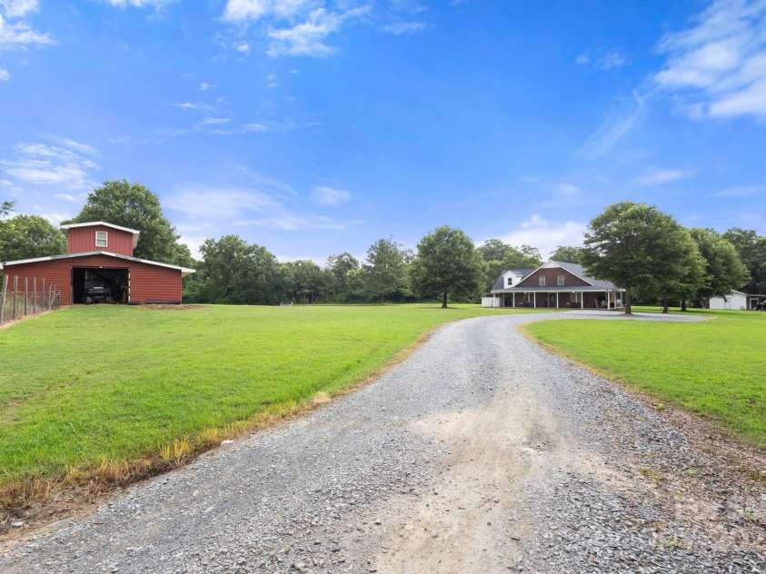 3451 Greene Road, Monroe, NC 28110.  MLS# CAR4271557, YatesRealty ID 23327. Nicely set back for loads of privacy