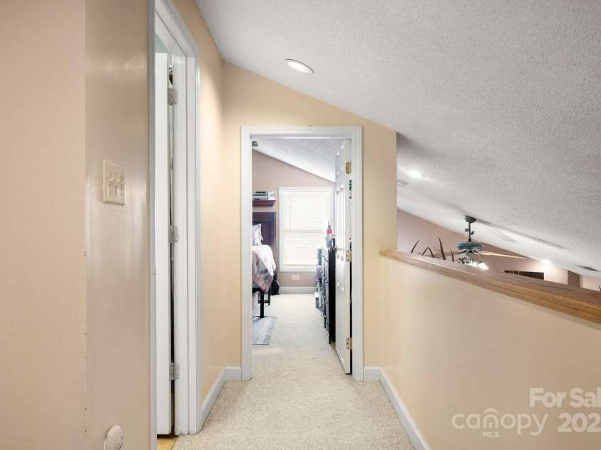 3451 Greene Road, Monroe, NC 28110.  MLS# CAR4271557, YatesRealty ID 23327. Upstairs hall, Full Bath on your Left then leads to Loft that could easily be closed in for 3rd Bedroom privacy