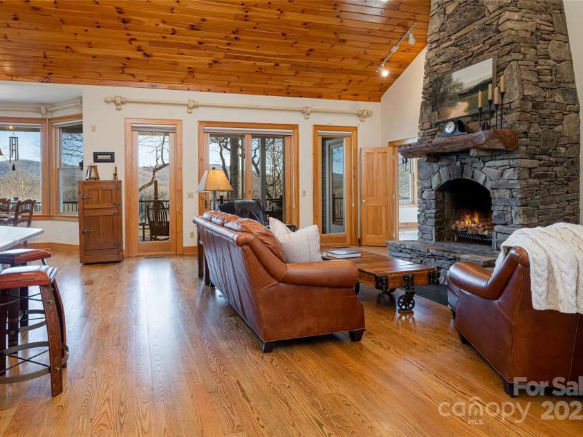 1987 Rabbit Hop Road, Spruce Pine, NC 28777.  MLS# CAR4270357, YatesRealty ID 23328. Cozy Fireplace in the main residence