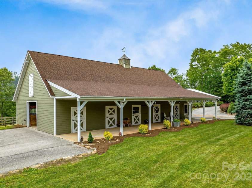 1987 Rabbit Hop Road, Spruce Pine, NC 28777.  MLS# CAR4270357, YatesRealty ID 23328. Heated 6-Stall Stables