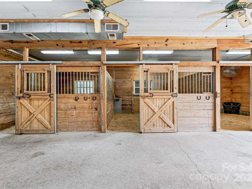 1987 Rabbit Hop Road, Spruce Pine, NC 28777.  MLS# CAR4270357, YatesRealty ID 23328. Stable stalls