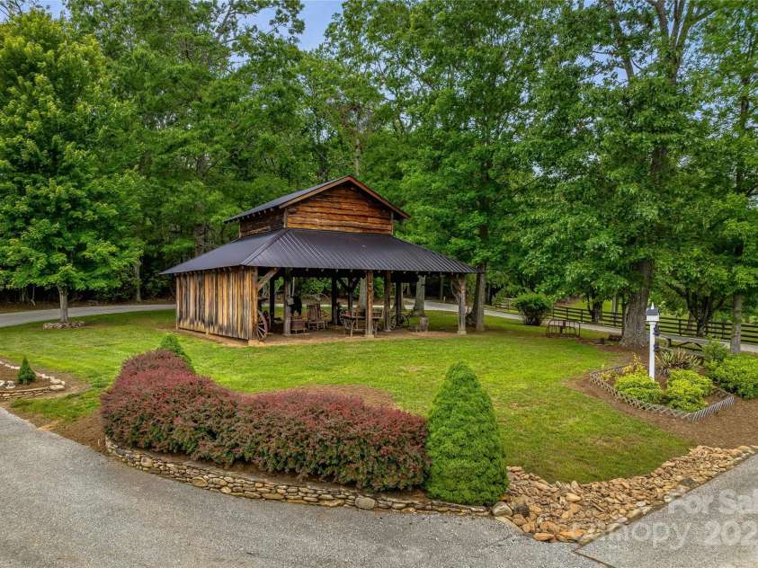 1987 Rabbit Hop Road, Spruce Pine, NC 28777.  MLS# CAR4270357, YatesRealty ID 23328. The picturesque blacksmith shop that is a covered pavilion