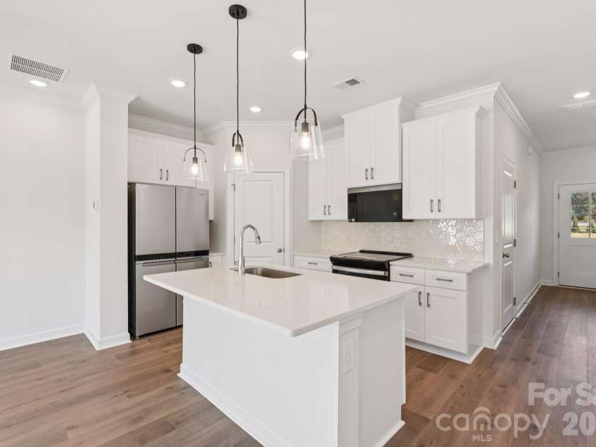 429 Markridge Loop, Fort Mill, SC 29708.  MLS# CAR4349020, YatesRealty ID 23328. Photo is not of the actual home, but is an inspirational photo of builder’s model home and may depict options, furnishings, and/or decorator features that are not included