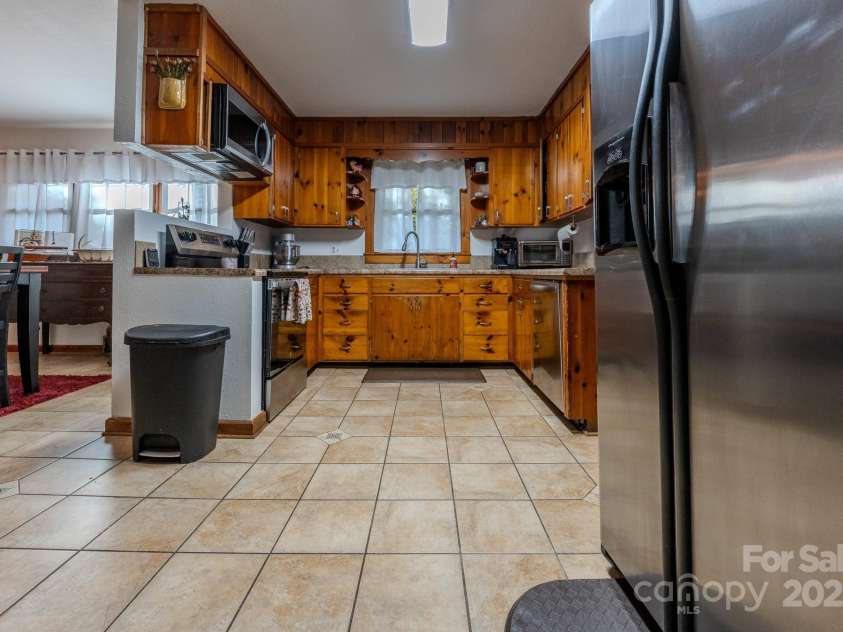 127 Reid Queen Drive, Little Switzerland, NC 28749.  MLS# CAR4326827, YatesRealty ID 2333. 