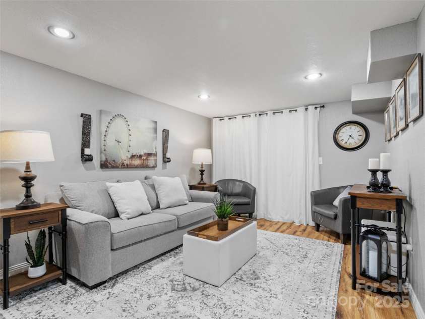 189 Poverty Branch Road, Barnardsville, NC 28709.  MLS# CAR4276020, YatesRealty ID 23331. Den-basement