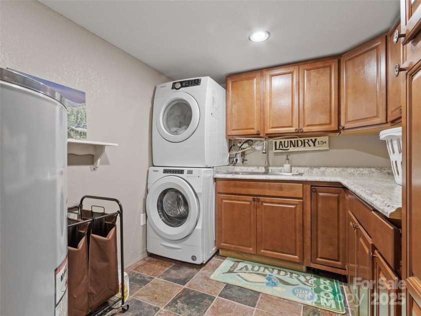 189 Poverty Branch Road, Barnardsville, NC 28709.  MLS# CAR4276020, YatesRealty ID 23331. Laundry room in basement