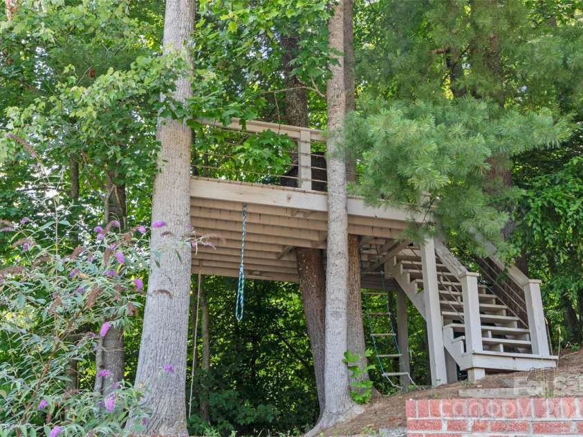 189 Poverty Branch Road, Barnardsville, NC 28709.  MLS# CAR4276020, YatesRealty ID 23331. Treehouse deck
