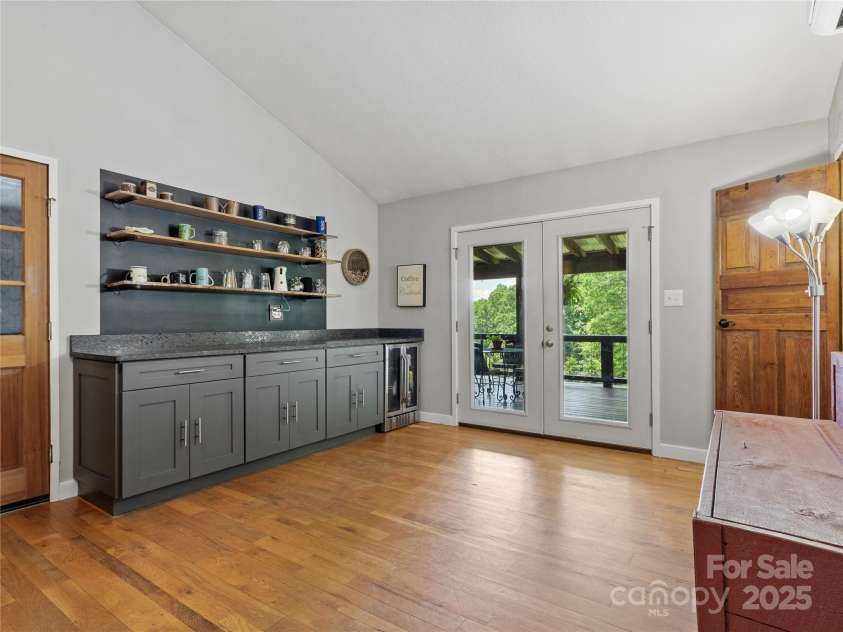 47 Old Chimney Drive, Burnsville, NC 28714.  MLS# CAR4269340, YatesRealty ID 23334. Extended cabinetry with beverage refrigerator