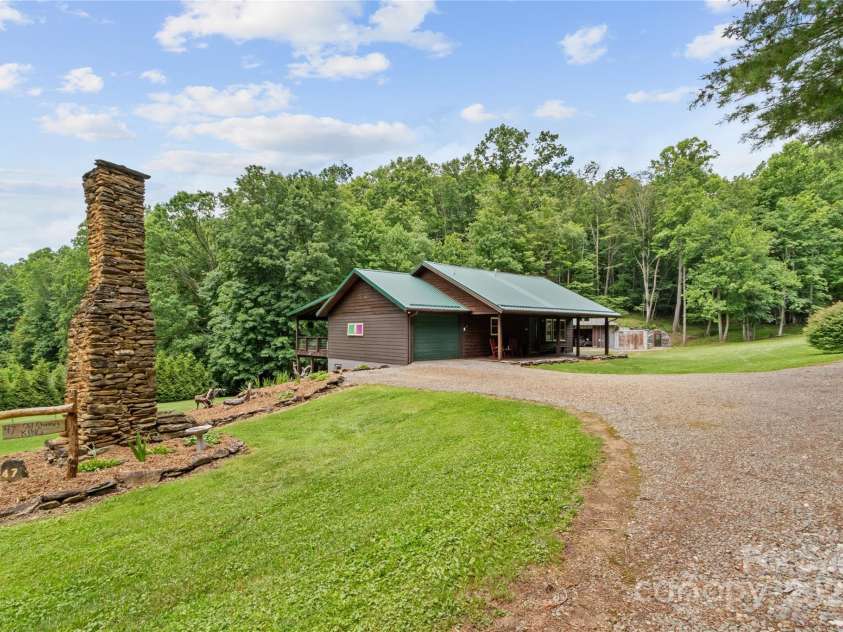 47 Old Chimney Drive, Burnsville, NC 28714.  MLS# CAR4269340, YatesRealty ID 23334. First view of the property as you turn into the driveway